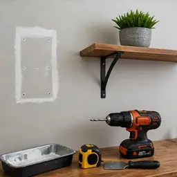 Handyman Services: Drywall patch, shelf, and handyman tools